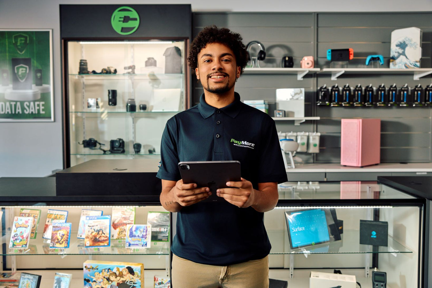 employee holding a tablet and smiling